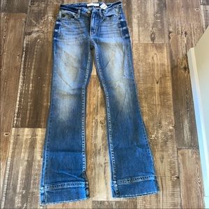 Med flare, cute. Stretchy material.